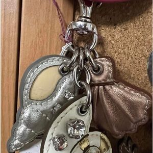 Coach Seashell fob with crystal stones